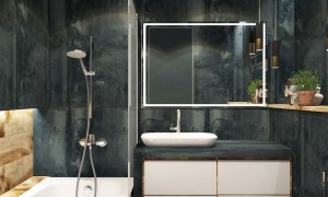 A dark-tiled bathroom