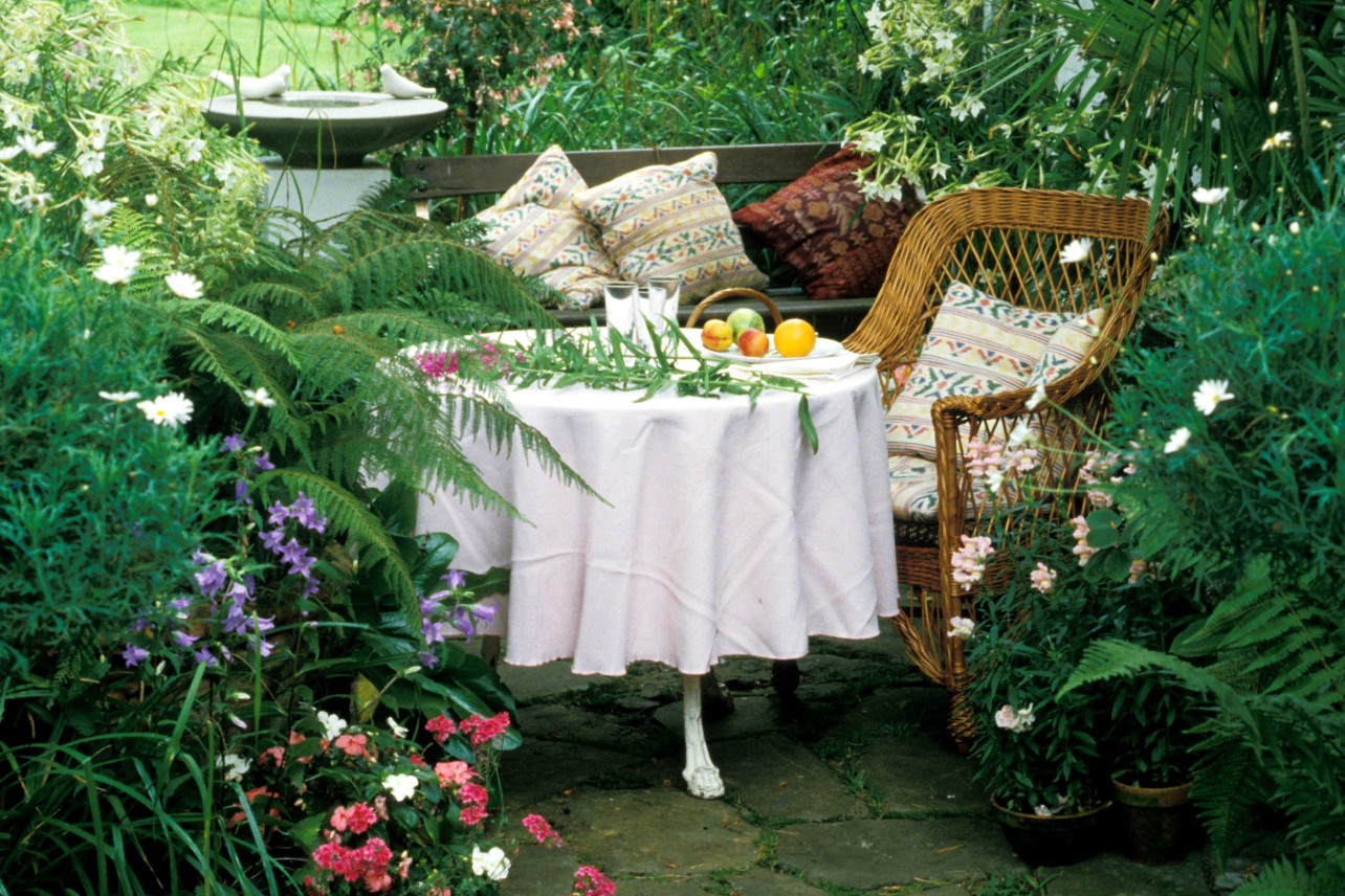 Outdoor table with wicker chairs