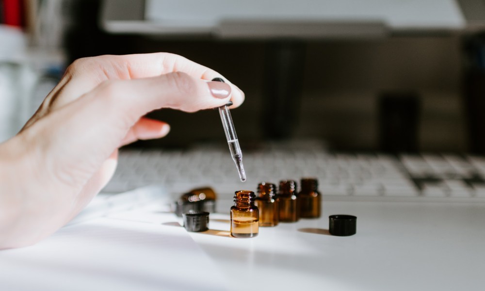 Several bottles of essential oils on a counter