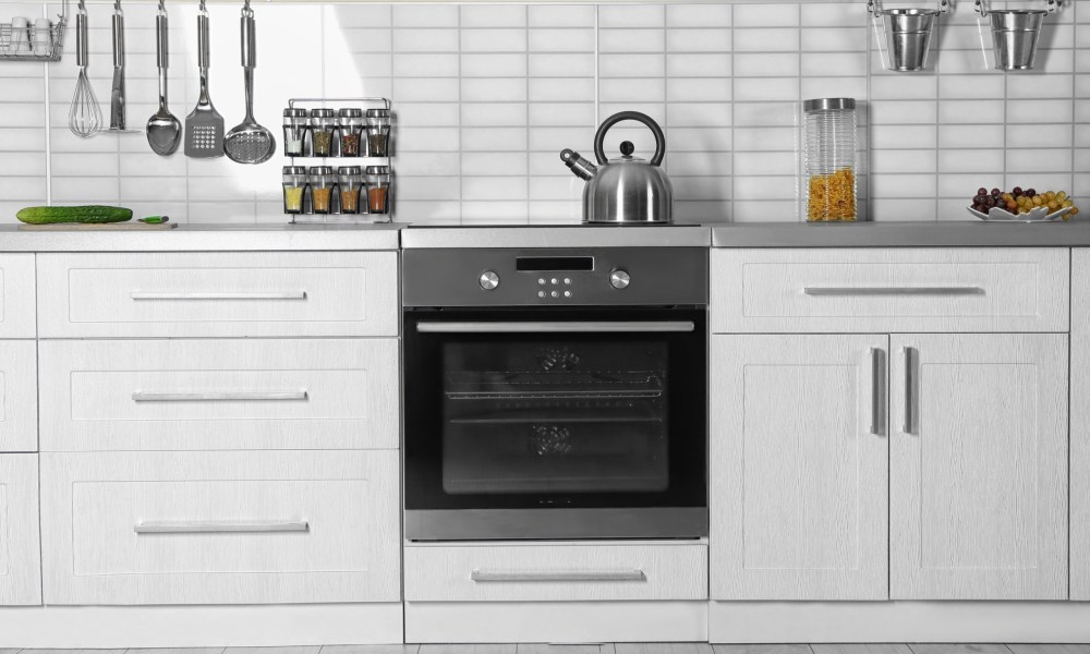 Stovetop and oven in kitchen