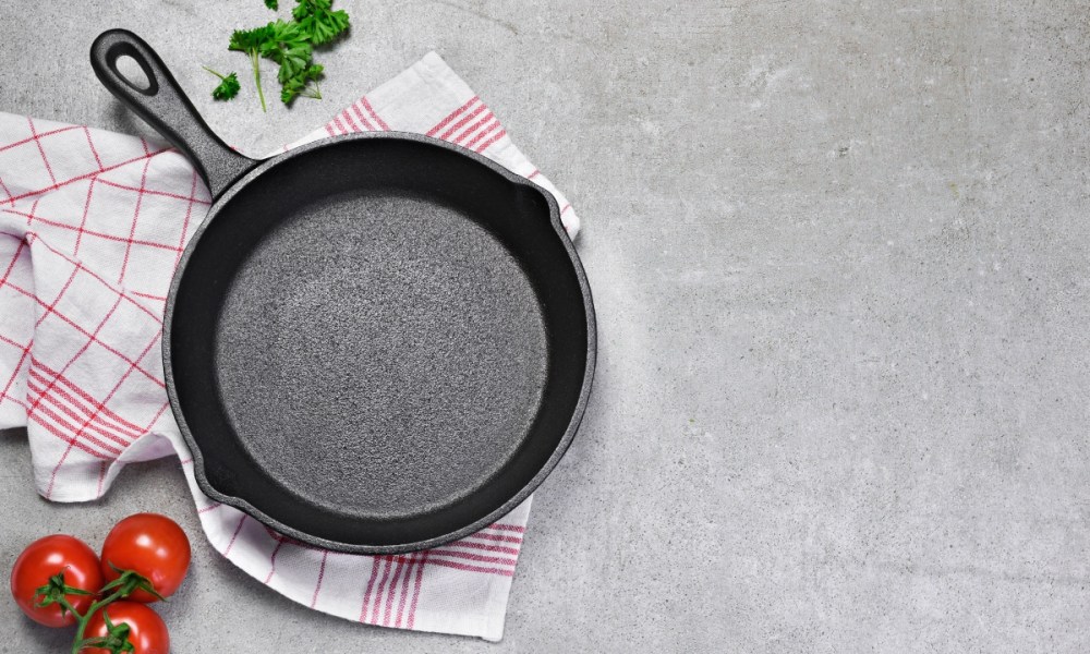 clean cast iron pan on table