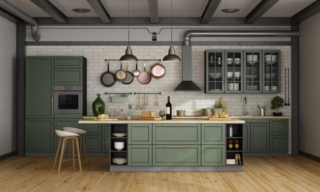 Organized kitchen with sage green cabinets