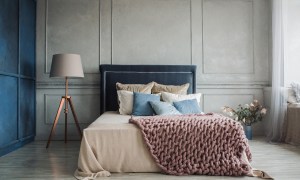 beautiful bedroom with blue and grey walls