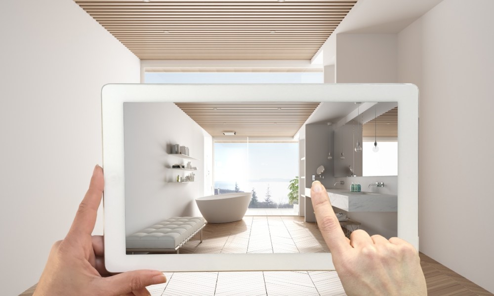 Person using an augmented reality app for home design