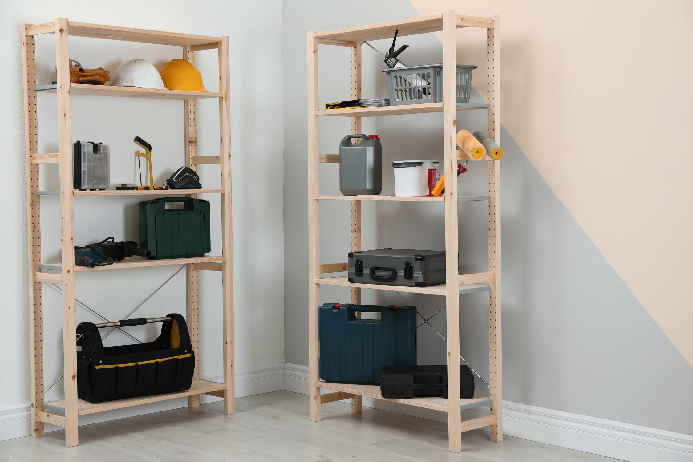 Storage shelves in a corner against white walls