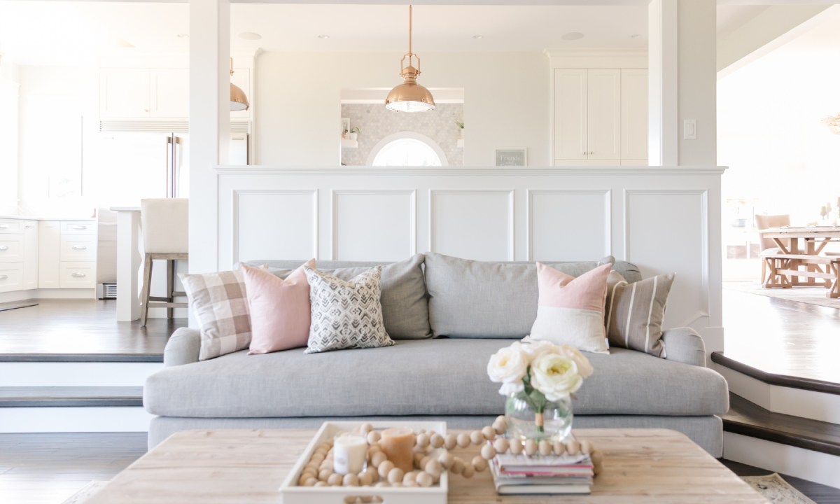 Farmhouse living room with gray couch.