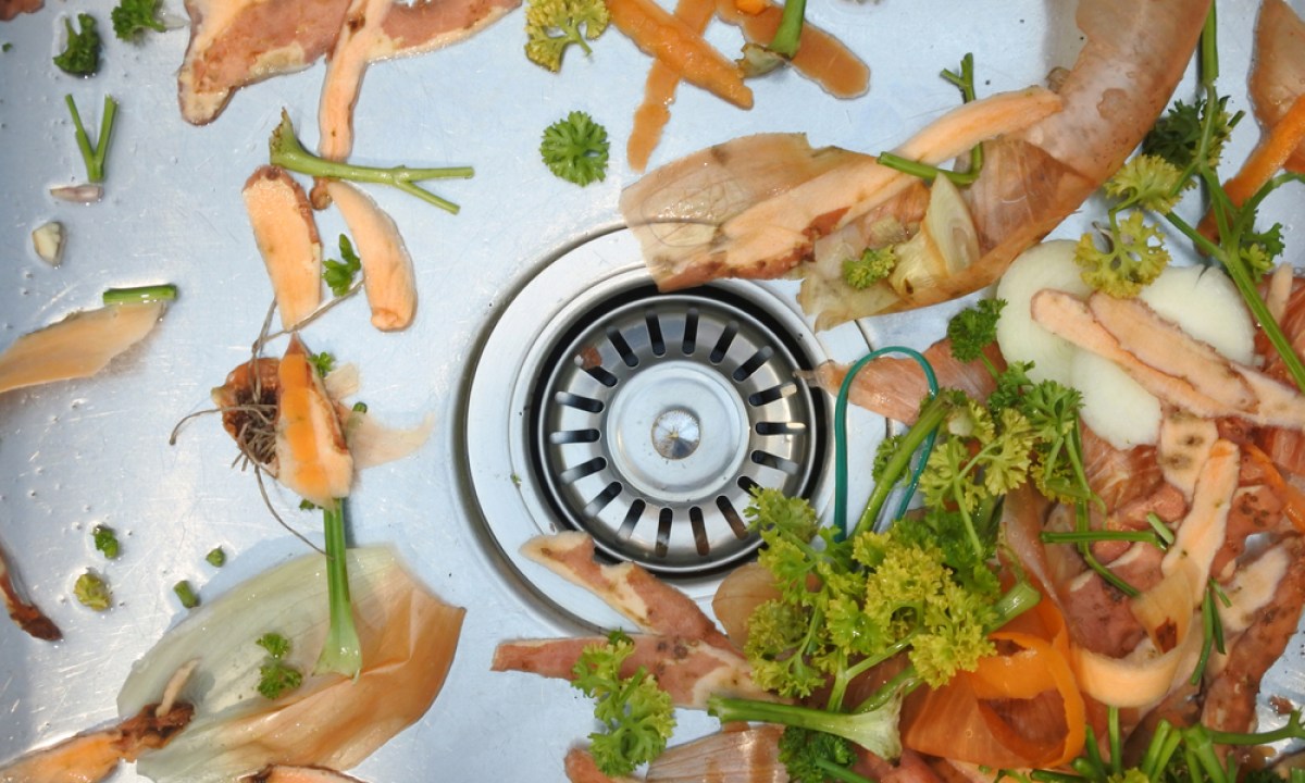 Sink drain with food scraps in it