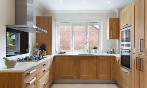 Oak cabinets in a small apartment kitchen