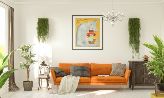 Orange couch in retro midcentury modern living room design