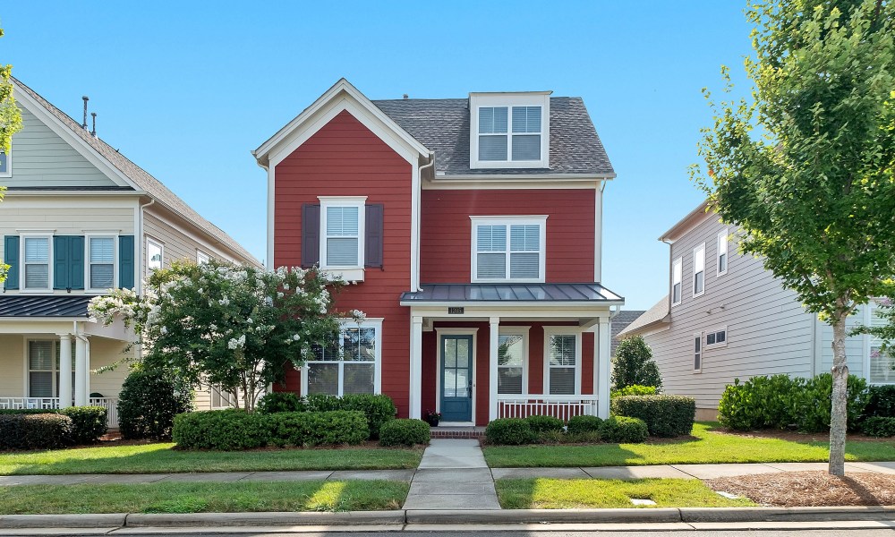 Small red house with blue and white accents