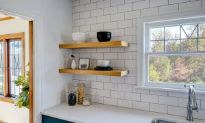 Kitchen floating shelves with matte tile backsplash