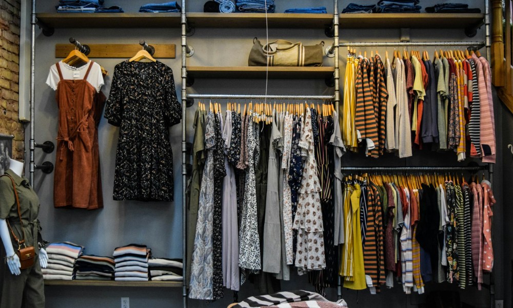 Full shelves and rods in a large closet