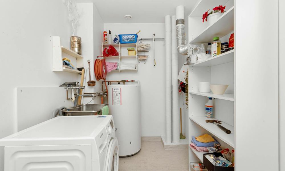 Tank water heater in a home's utility room